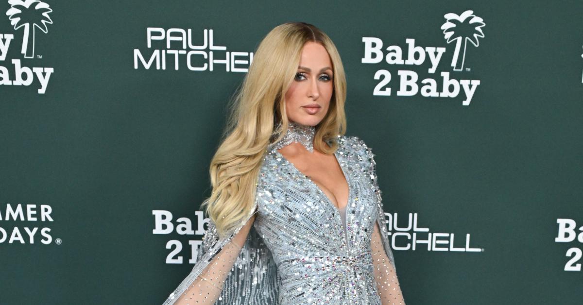 Image of Paris Hilton admitted paparazzi would hire 'look-alikes' to snap fake photos of her.