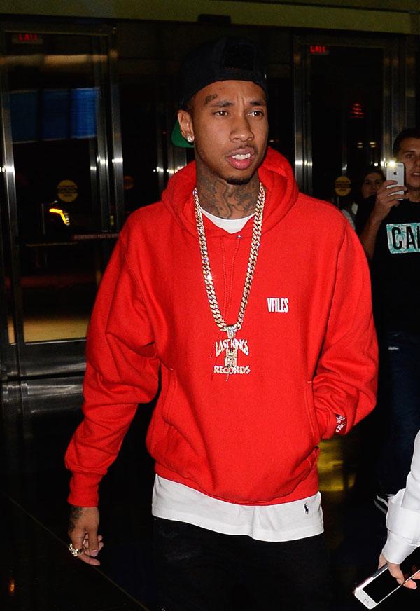 Kardashian hire spy tyga 03