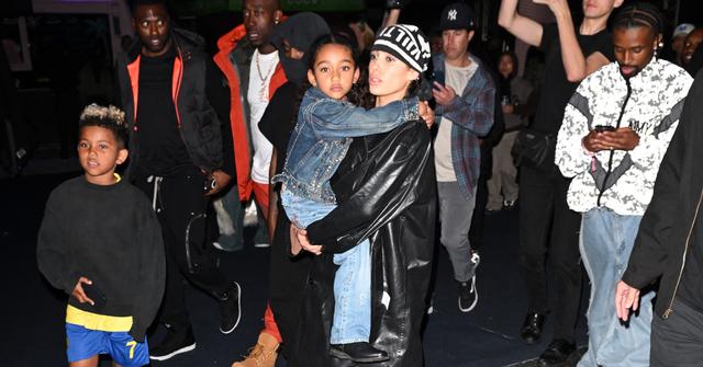 kanye wests bianca censori holds chicago kim kardashian