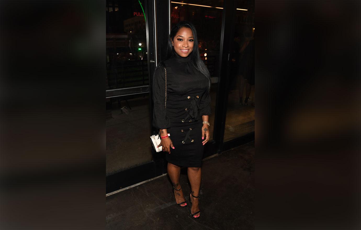 Toya Wright in black dress