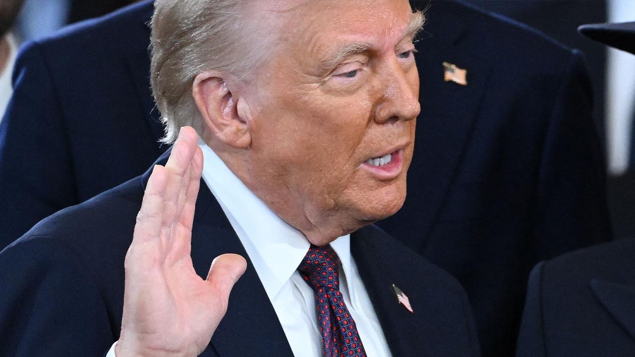Image of The White House said Donald Trump's hand bruising is due to frequent hand shaking, aspirin and a chronic condition..