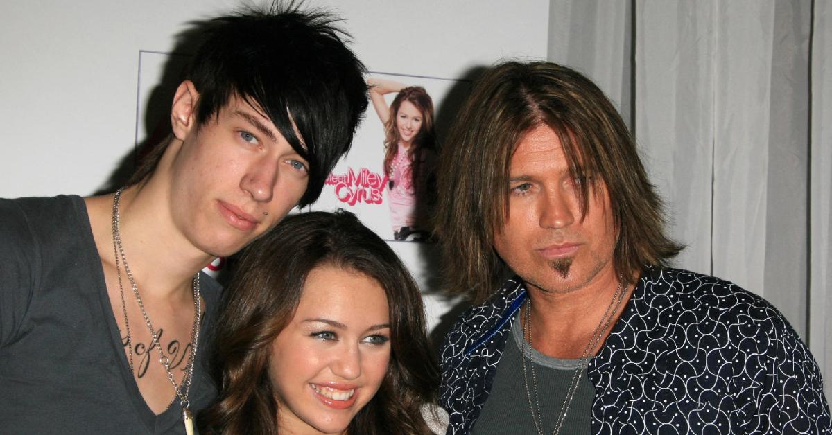 Photo of Billy Ray Cyrus, Trace Cyrus and Miley Cyrus.