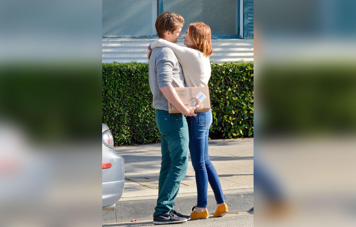 Emma Stone Holds Hands with Husband Dave McCary During Walk Around