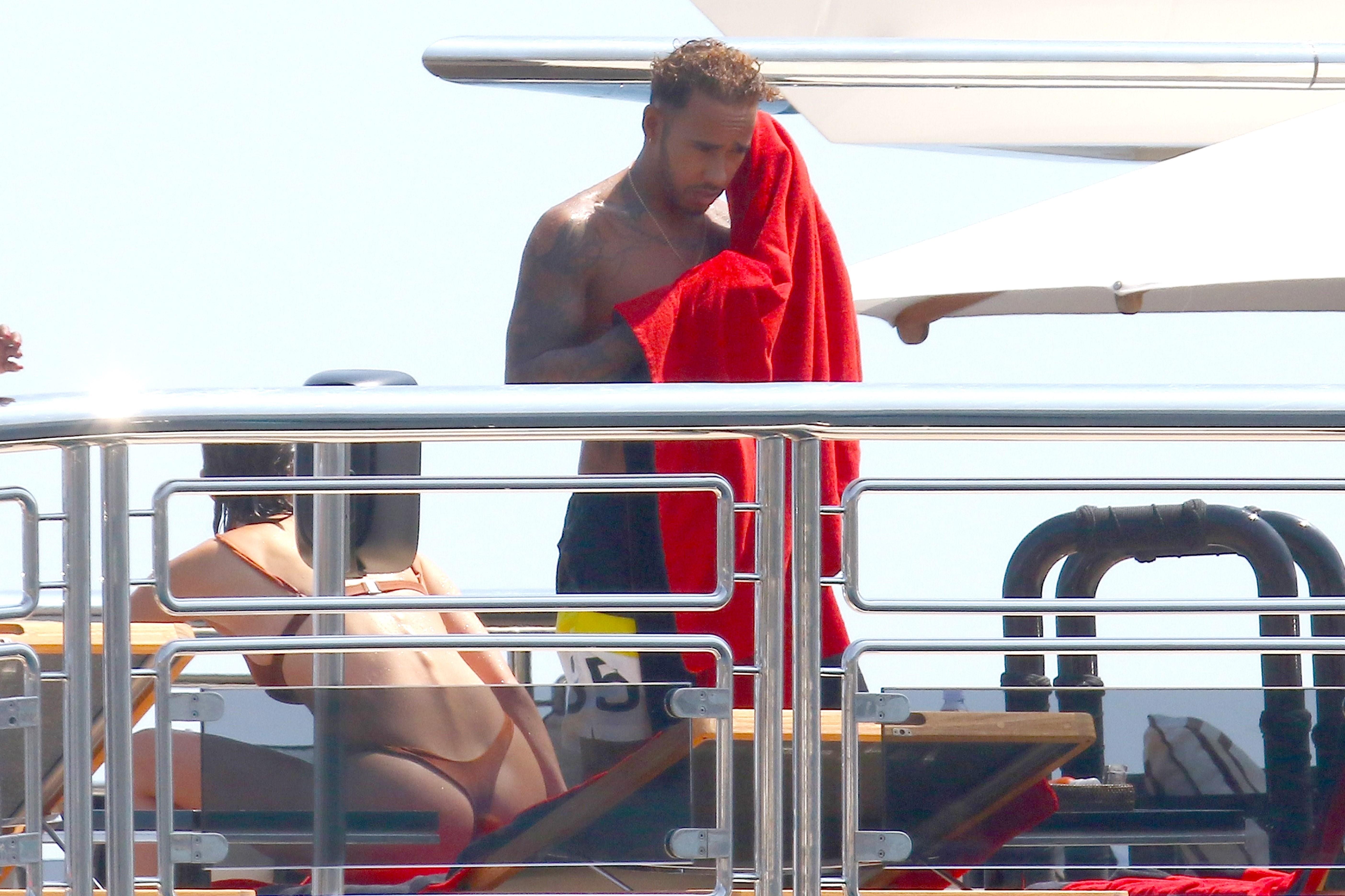 *EXCLUSIVE* Bella Hadid picks out her best thong bikini for yacht jumping with Lewis Hamilton