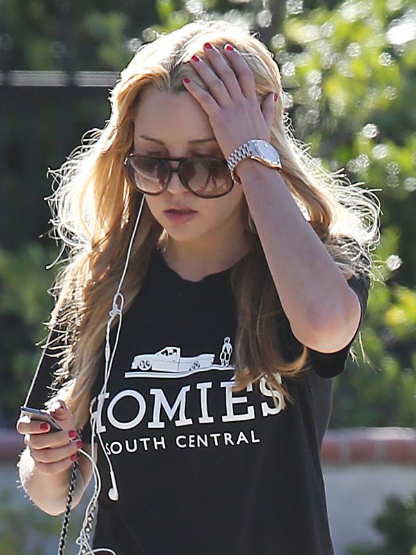 Amanda Bynes takes a morning walk around her neighborhood