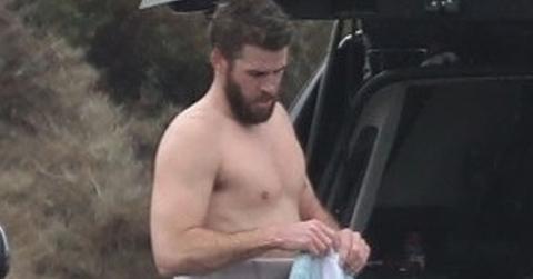 Liam hemsworth strips down after surfing malibu pics