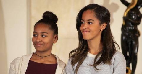 sasha obama malia hug airport