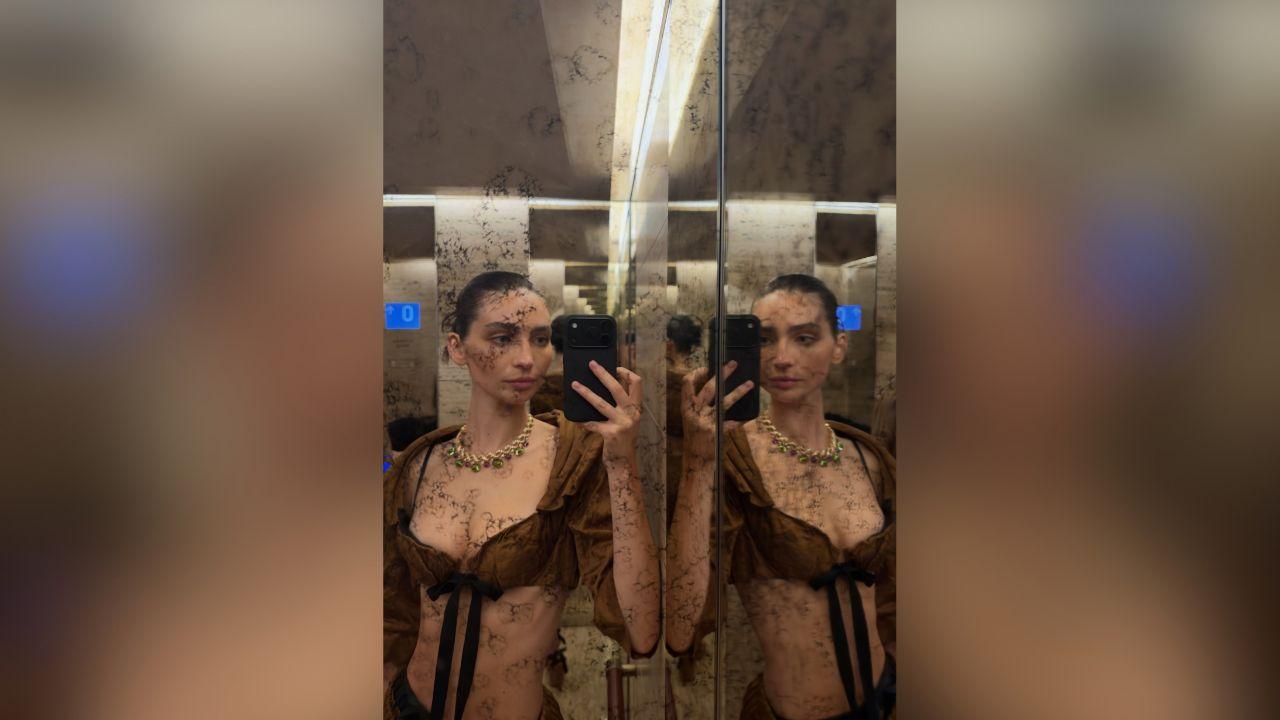 image of Meadow Walker showed off her abs in a tiny brown crop top during Milan Fashion Week.