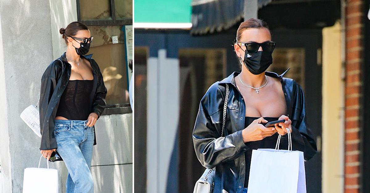 Irina Shayk Carries Burberry Olympia Bag As She Flashes Her Abs