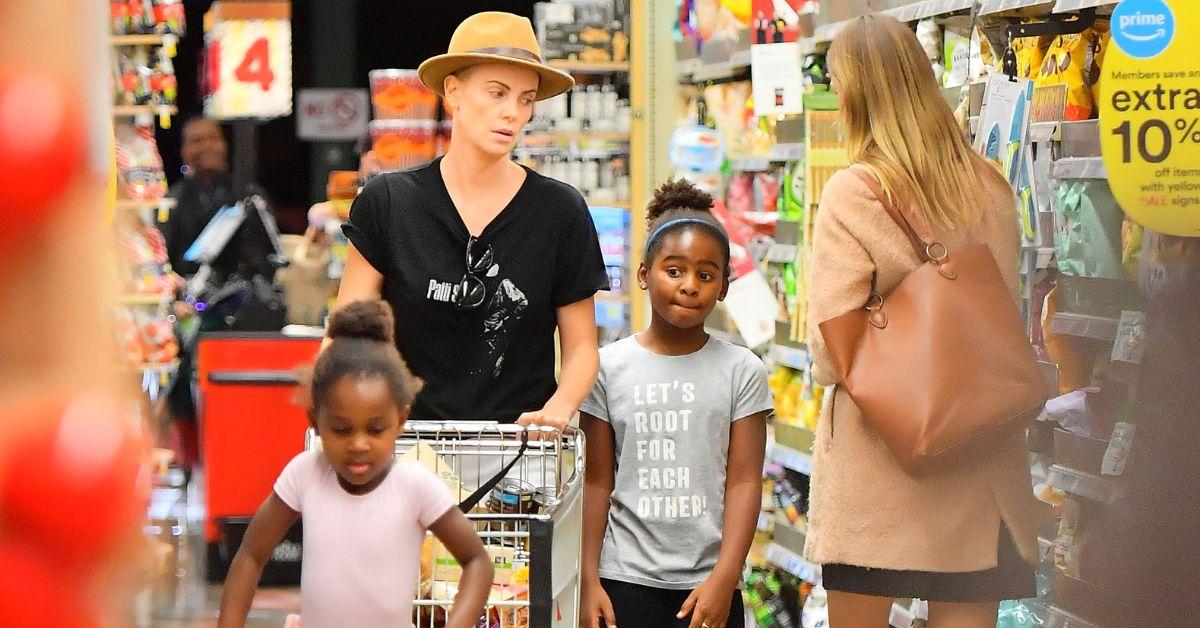 Photo of Charlize Theron and her daughters; August and Jackson.