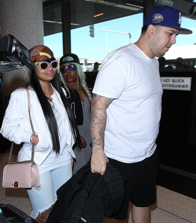 A significantly slimmer Rob Kardashian and Blac Chyna head out of LAX