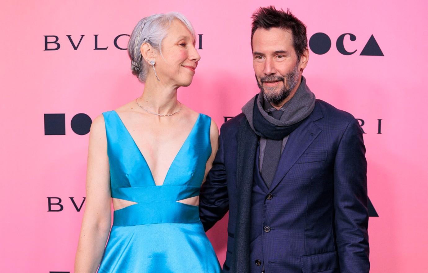 keanu reeves kisses girlfriend alexandra grant eyes open