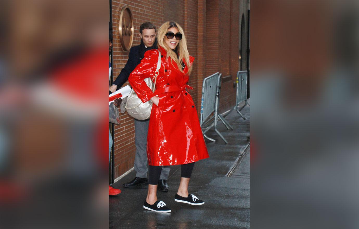 Wendy Williams Wearing red Trench Coat Outside of The View