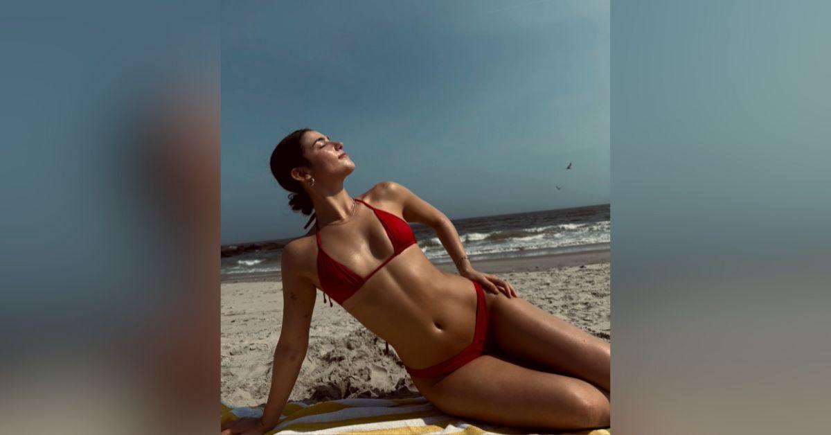 tiktok star bikini clad charli damelio love island subtle nod red hot beach photos