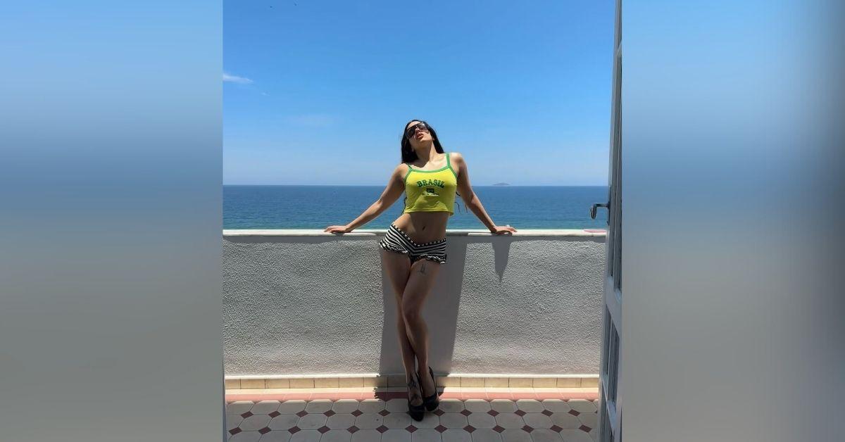 image of Rosalía showed off her toned stomach during her Brazil trip.