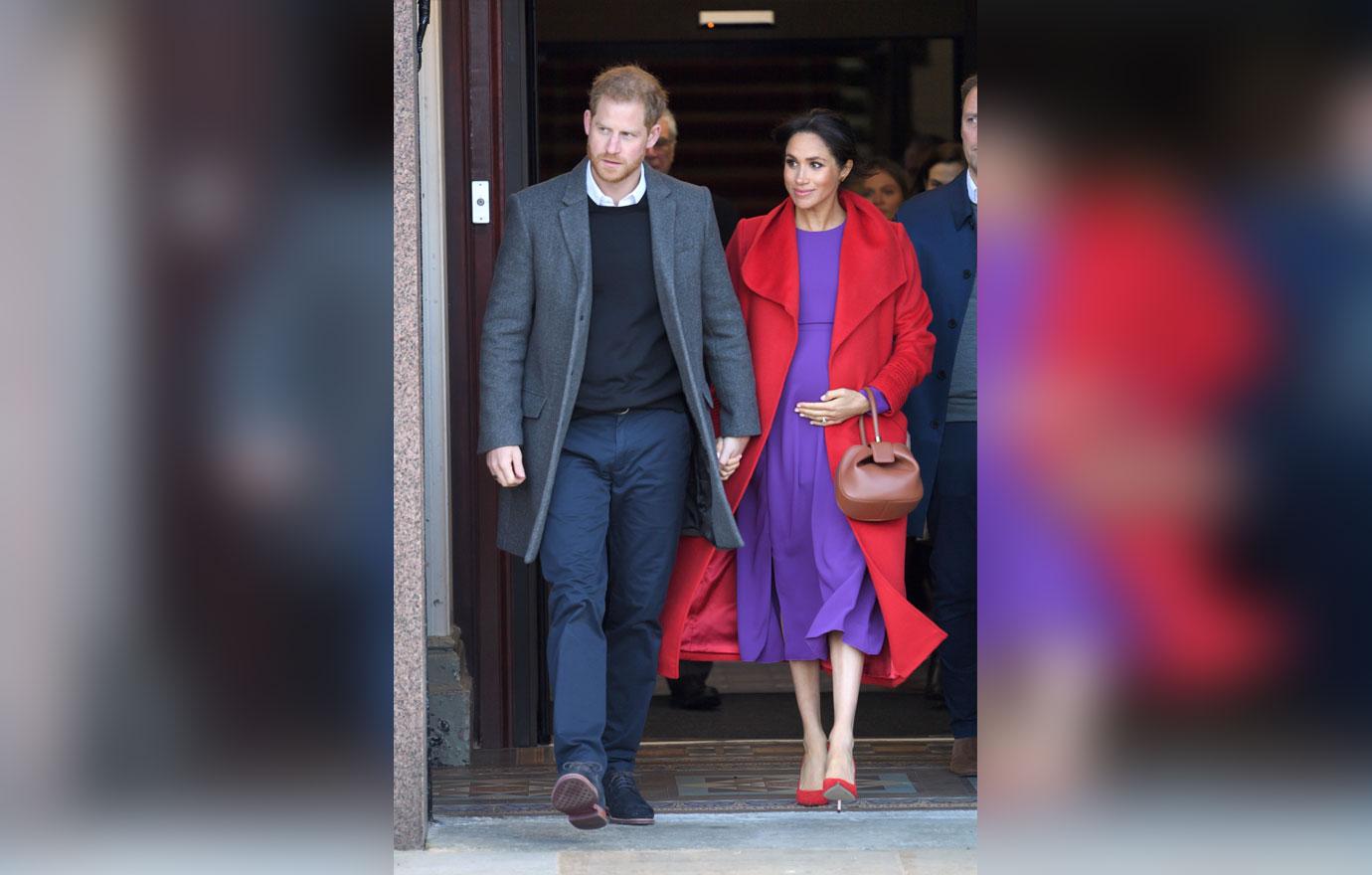 Meghan Markle wears red coat with Prince Harry