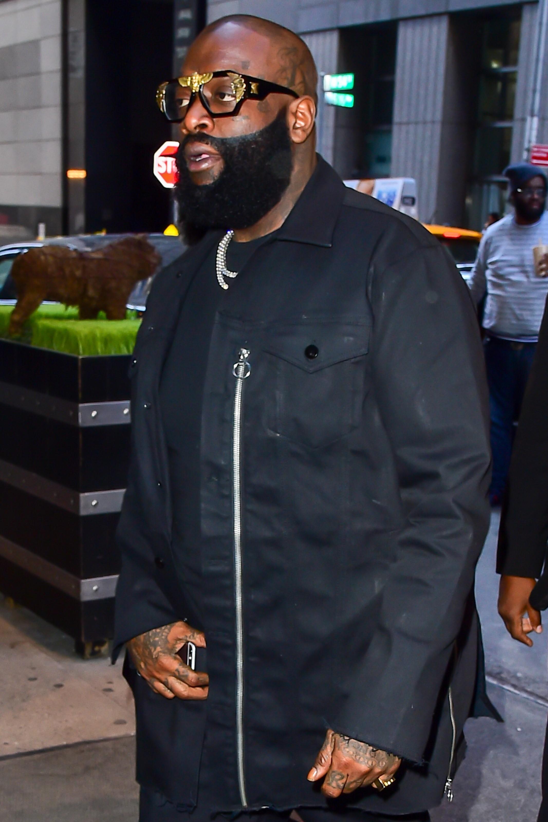 Rick Ross keeps it cool in NYC with his crew