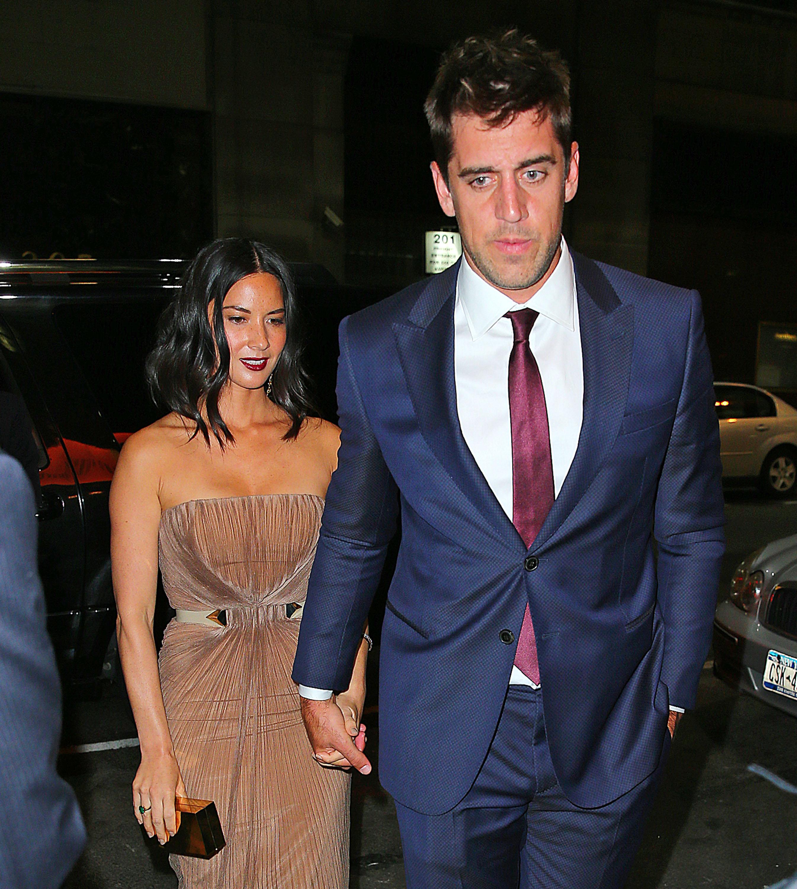 Olivia Munn and Aaron Rodgers are all smiles and holding hands when coming out of the SVA Theater in NYC