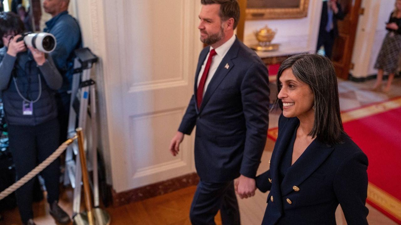 JD Vance and Usha holding hands at an event.