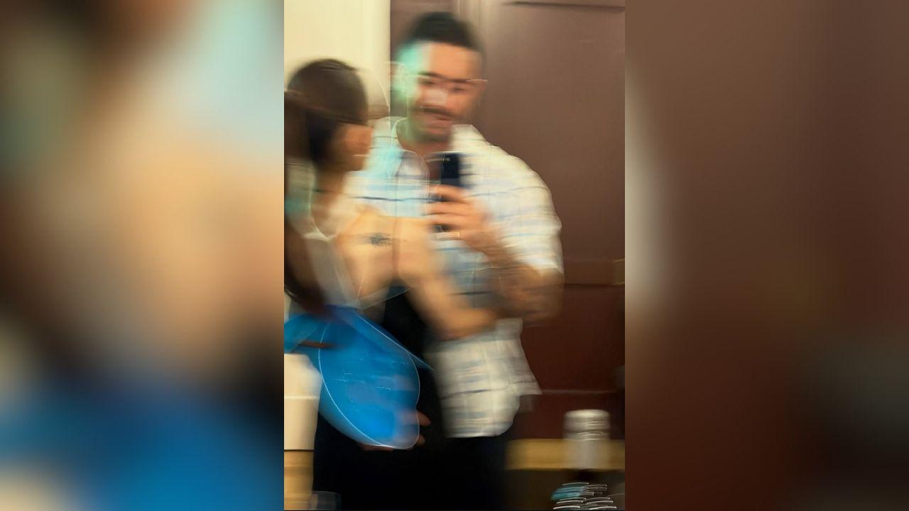 Image of Ariana Grande and Ricky Alvarez embraced for a photo, seemingly confirming their relationship.