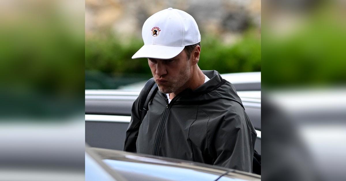 tom brady looks glum leaving gym