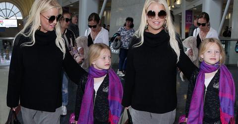 Jessica simpson covers baby bump