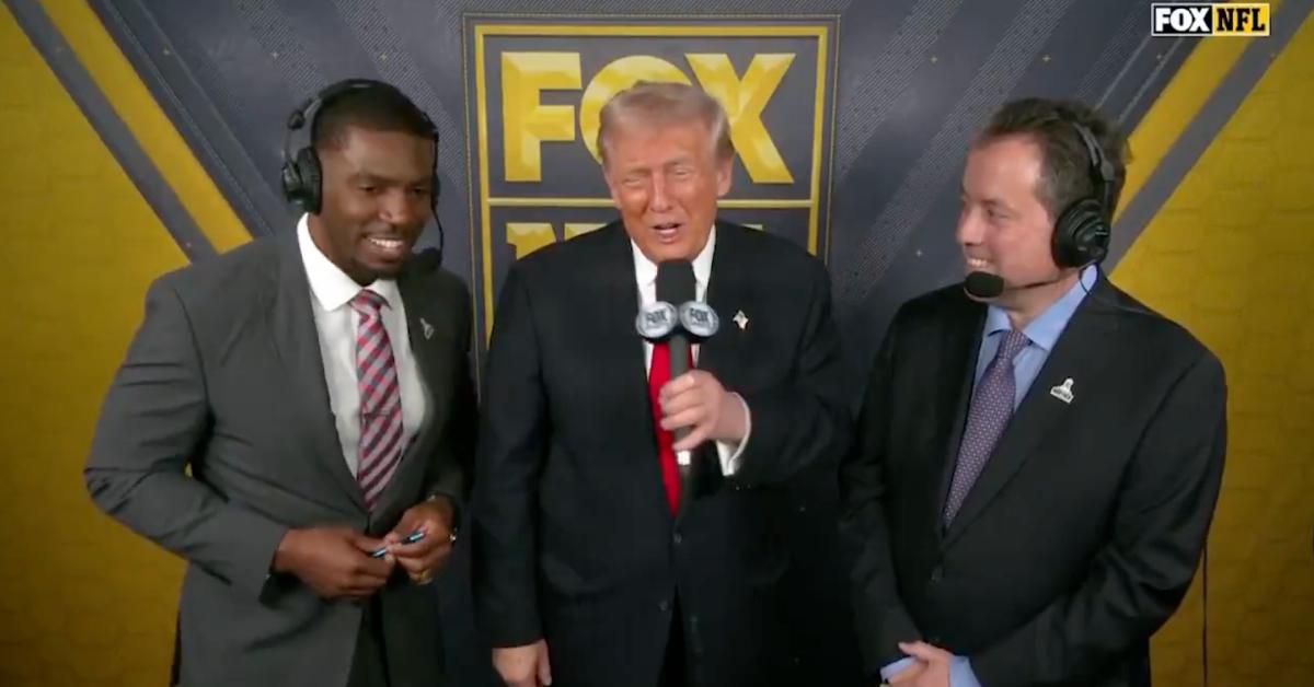 Image of Donald Trump chatted with sportscasters Kenny Albert and Jonathan Vilma during the game.