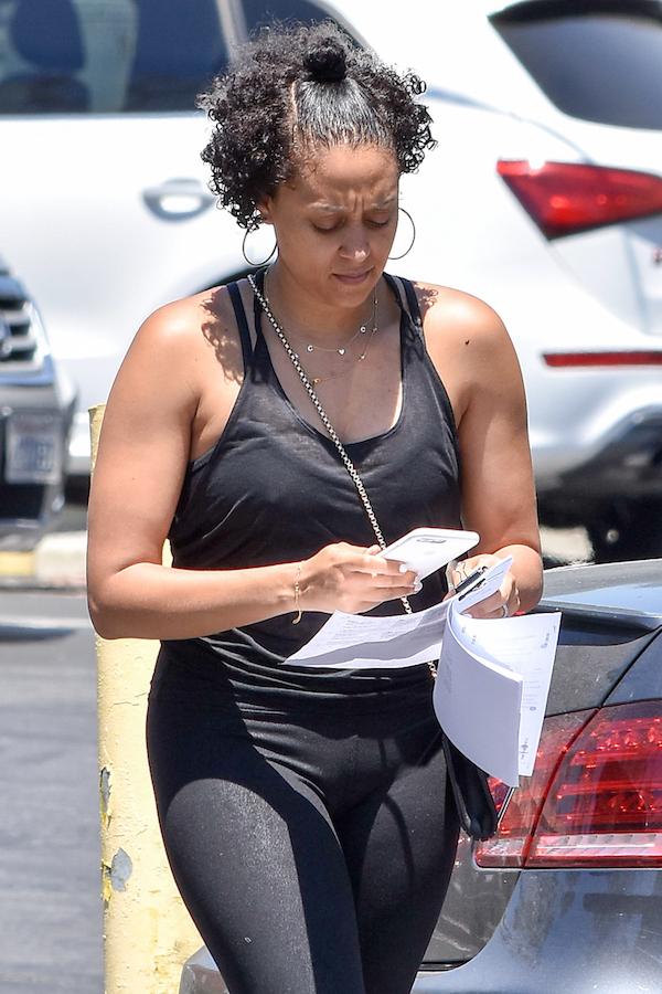 Tia Mowry Goes Without Makeup as she Drops a Package off at the UPS Store