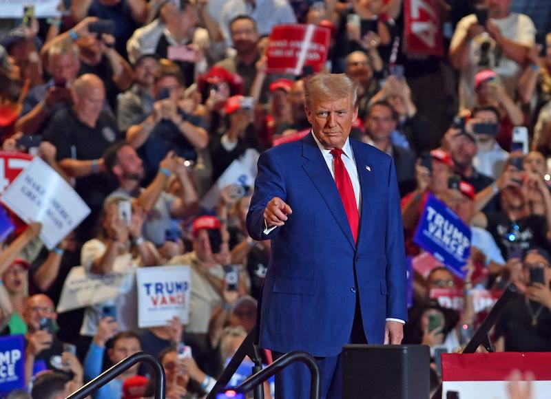 donald trump petting woman side head