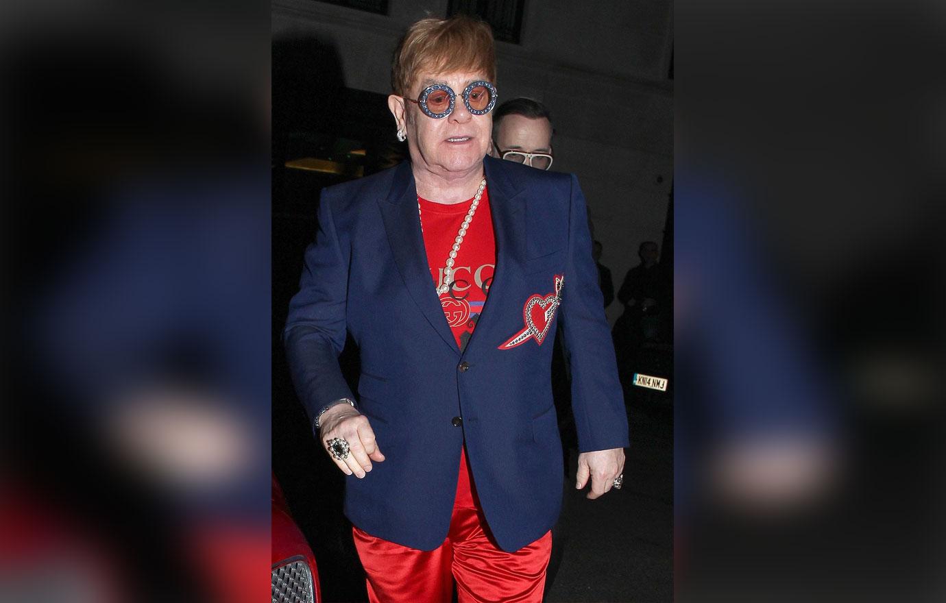 Elton John out in London with David Furnish for a night on the town