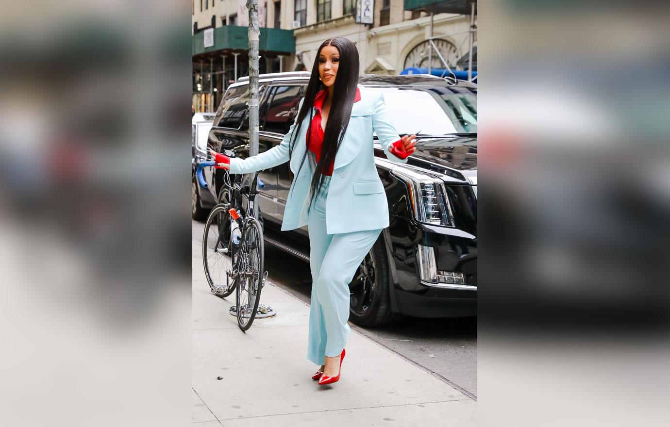 cardi b looks radiant in light bue suit