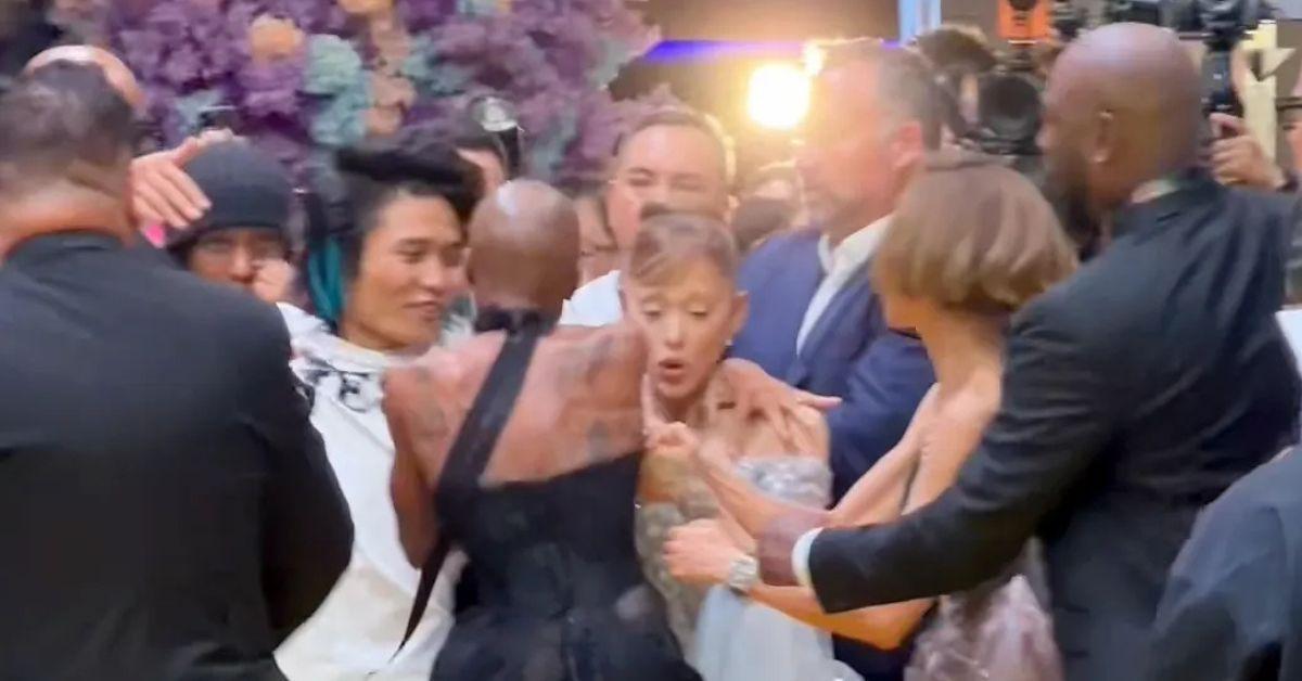 image of Cynthia Erivo put herself in between Grande and the rogue fan.