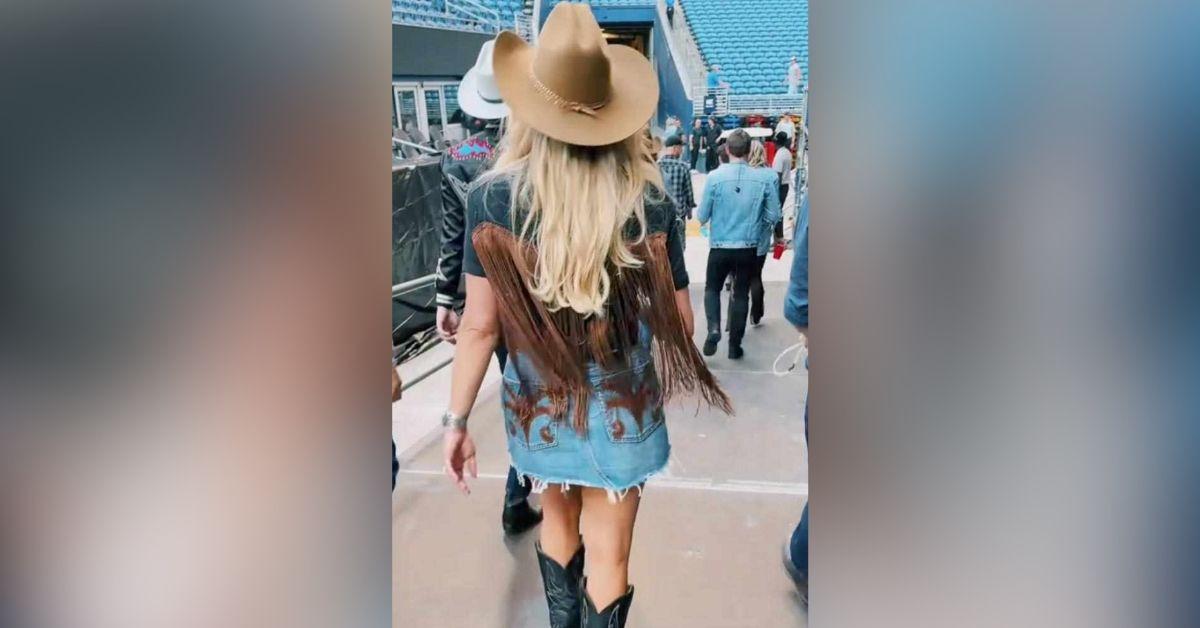 image of The country star's denim skort rode up during a performance, exposing her backside.