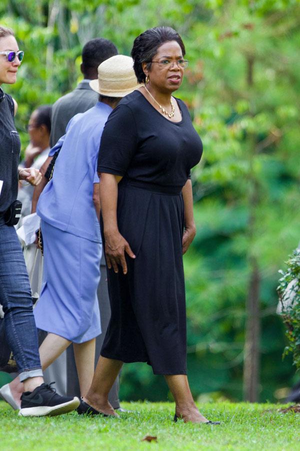 Oprah Winfrey, 69, shows off skinnier-than-ever waist in tight white dress  at the Smithsonian after drastic weight loss