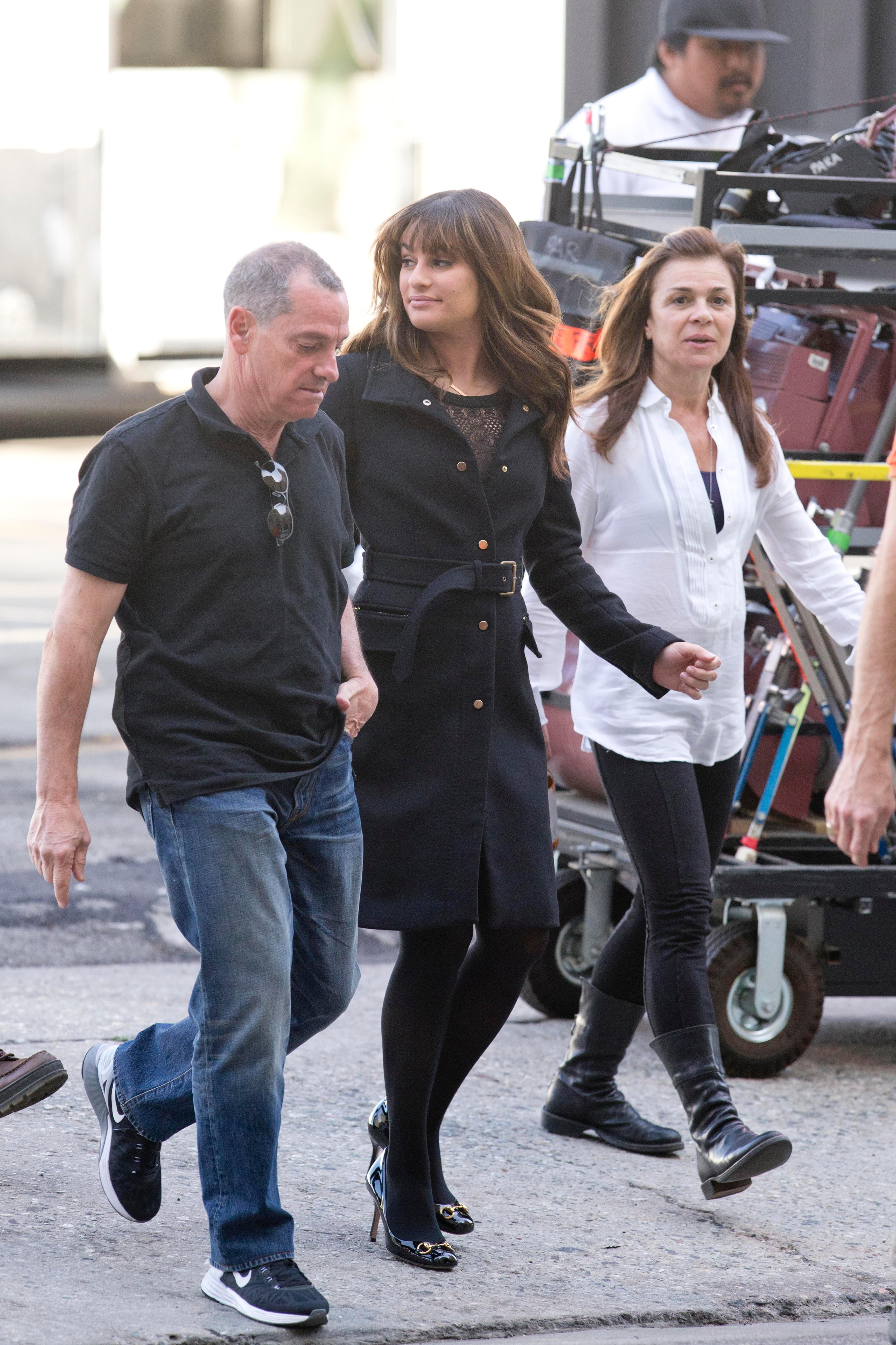 Lea Michele is flanked by her parents as she walks to set on the final season of &#8216;Glee&#8217;, in Downtown Los Angeles