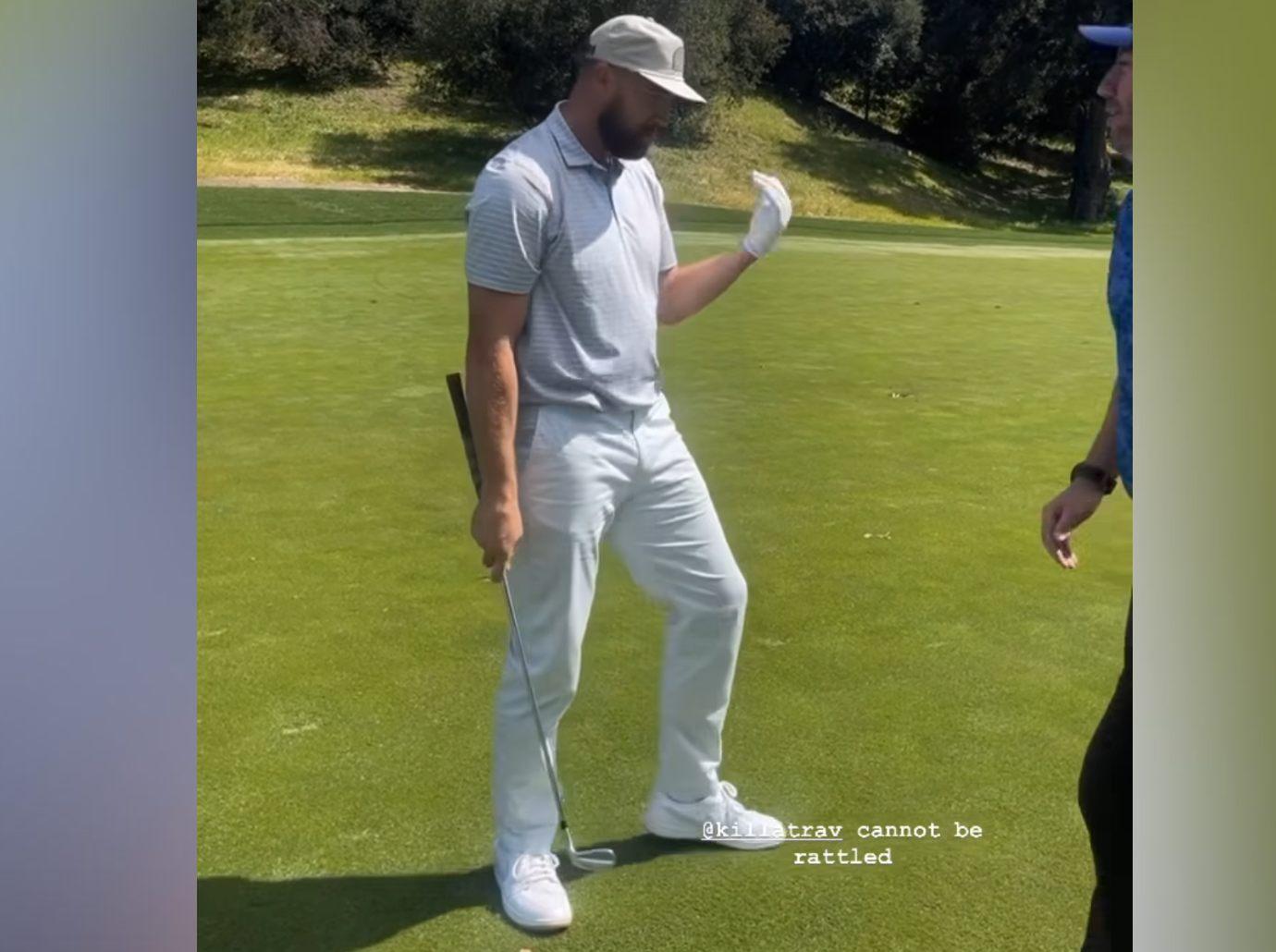 travis kelces friends try distract golf playing taylor swifts song watch