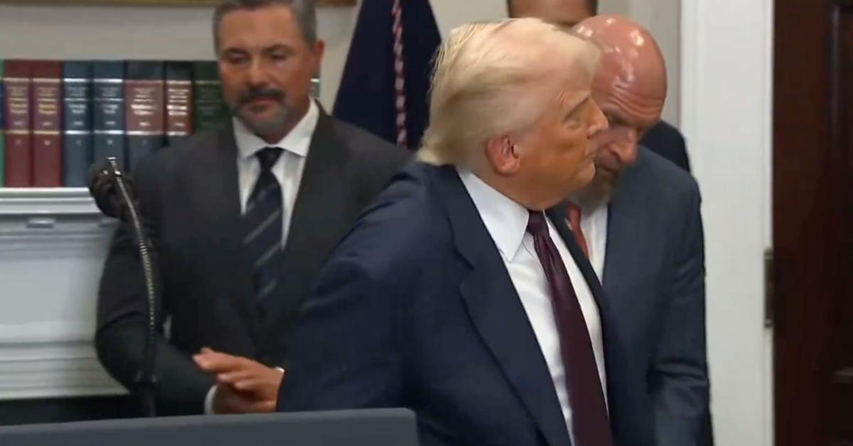 Image of the president's body jolted back as he was exiting a room.