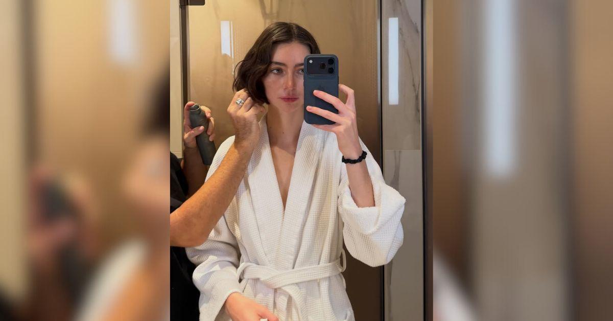 image of Meadow Walker appeared to being having her hair done as she snapped a mirror selfie.