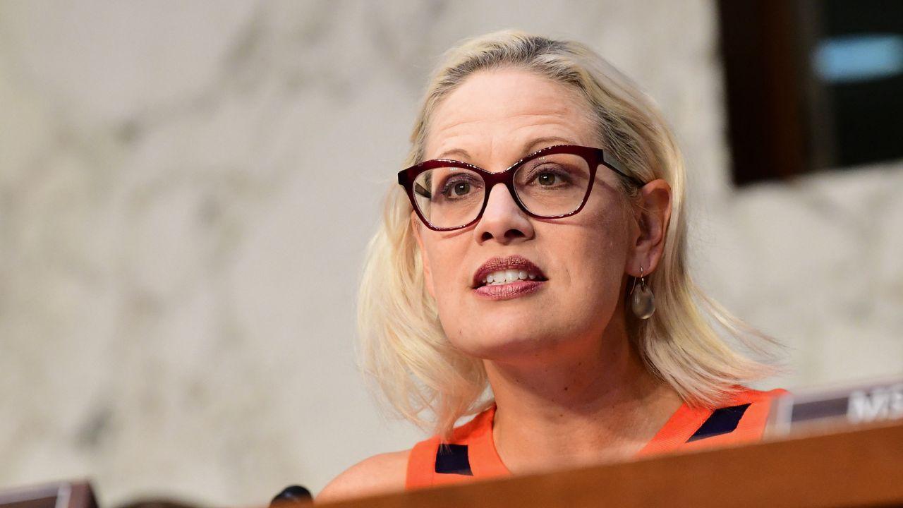 Image of Heather Ammel is suing Kyrsten Sinema, accusing the former Arizona senator of interfering in her marriage to Matthew.