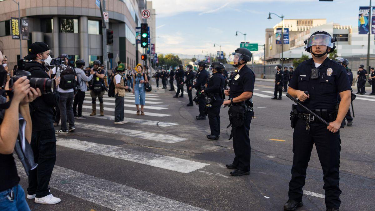 Image of Police moved in after unrest grew near a federal detention center.