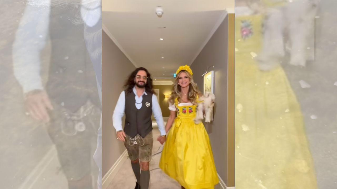 Image of The supermodel revealed the lingerie underneath her traditional look before slipping into a bright yellow dirndl.