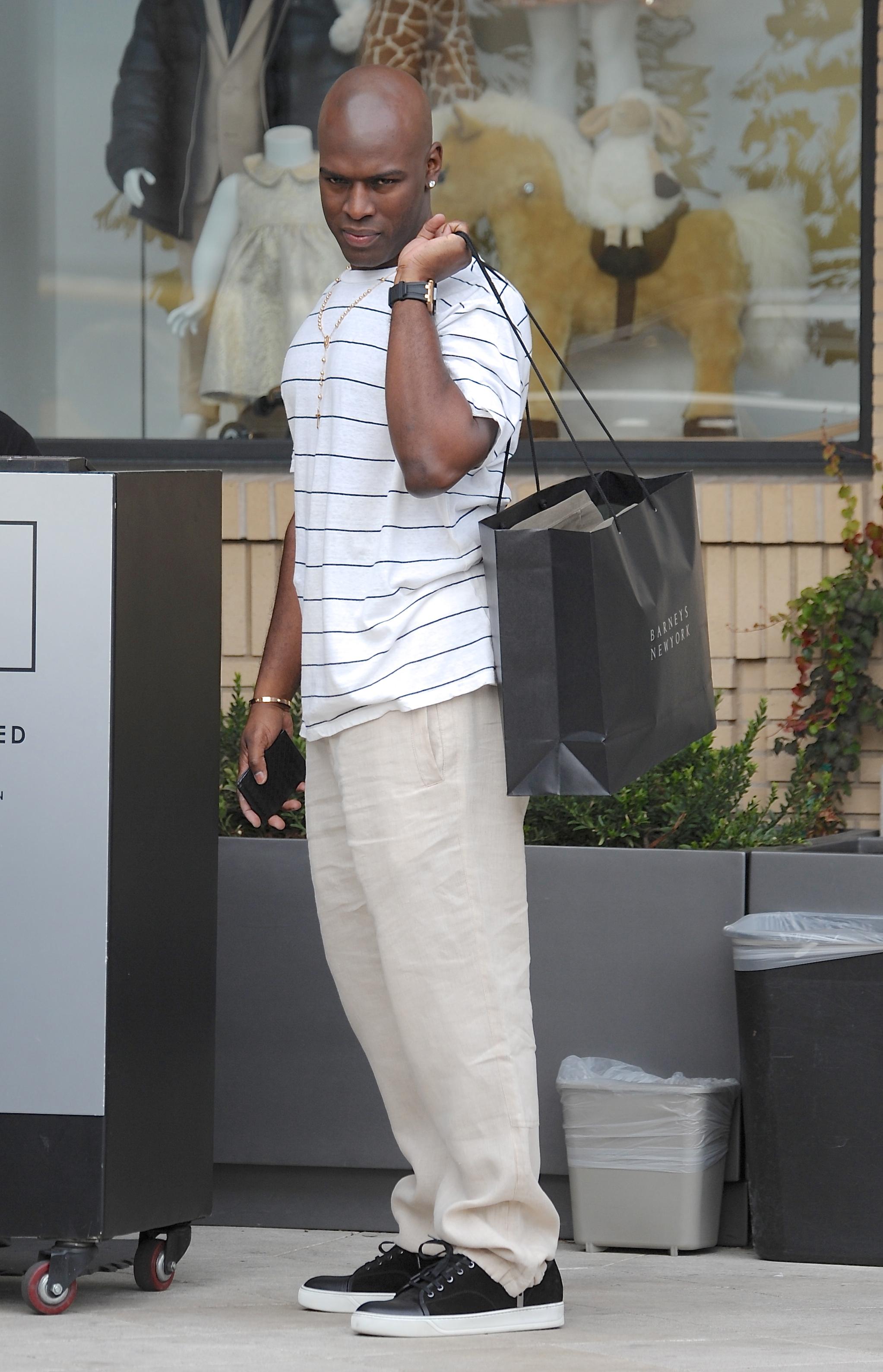 Corey Gamble leaves after shopping at Barneys New York in Beverly Hills