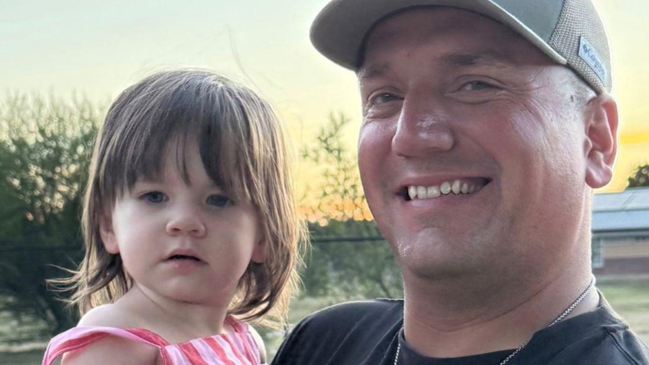 Image of Ken Urker and his daughter. 