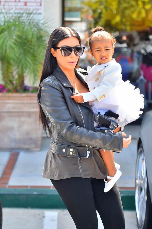 North West wears a Balmain jacket as she heads to dance class with Penelope Disick