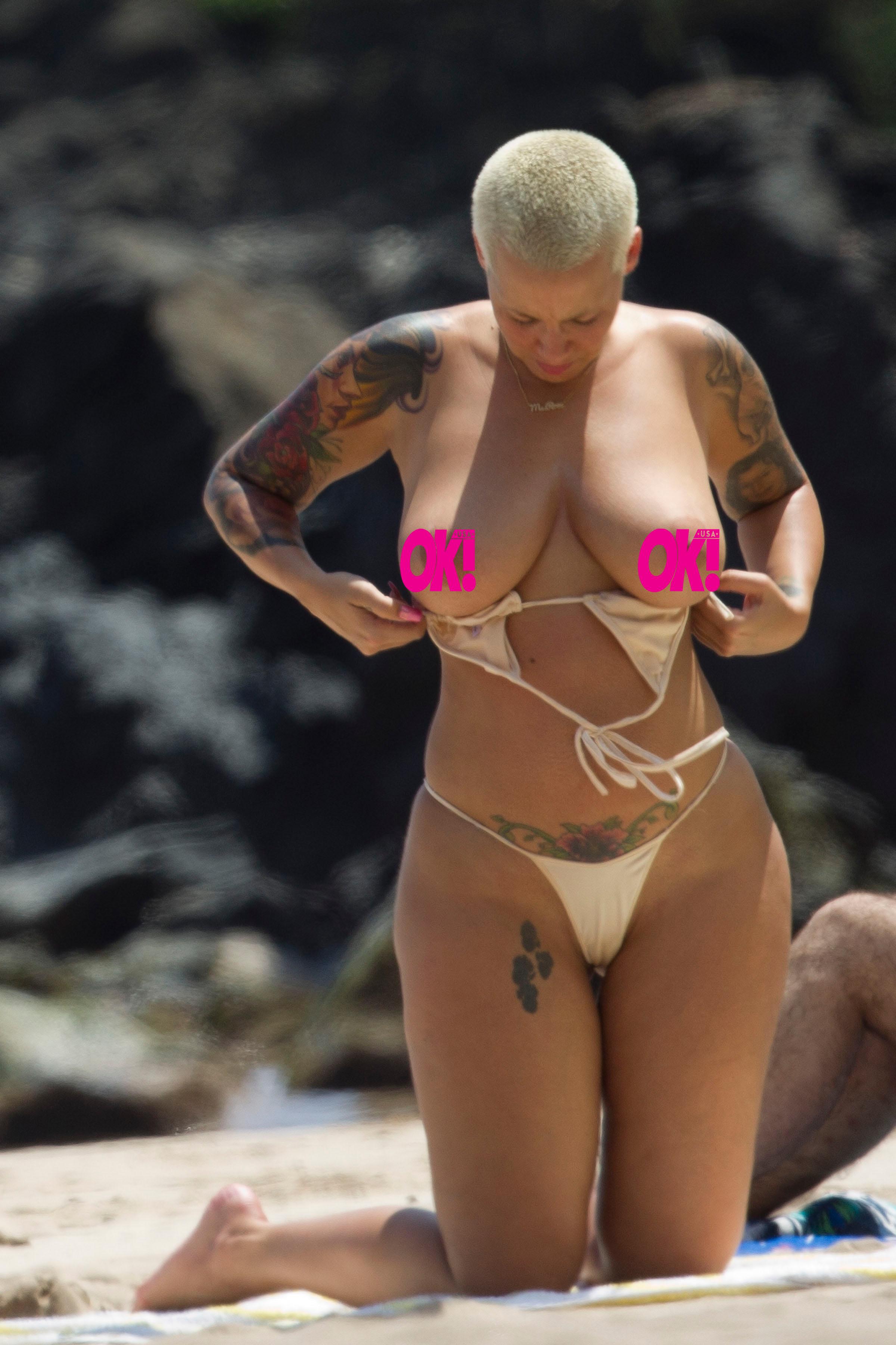 EXCLUSIVE: **WARNING NUDITY**** PREMIUM RATES APPLY** STRICTLY NO WEB UNTIL 9AM PST MARCH 27TH 2015** Amber Rose goes topless on a Maui beach.