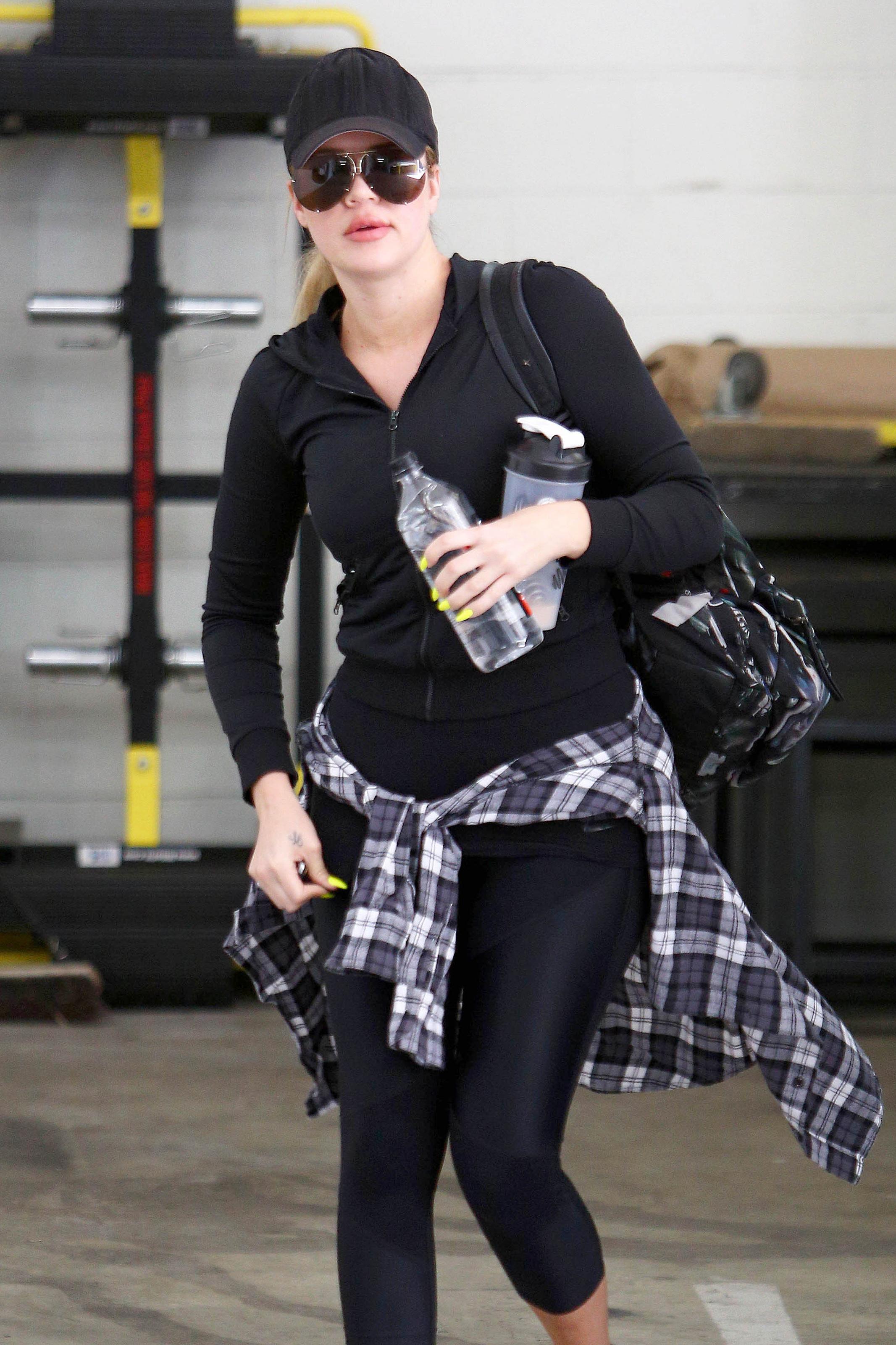 Khloe Kardashian works on her fitness with a personal training session