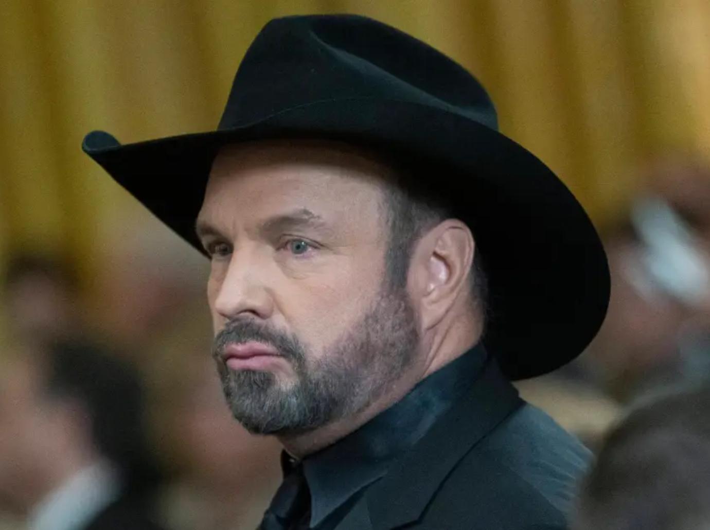 garth brooks accuser believed planned hire murder rape lawsuit