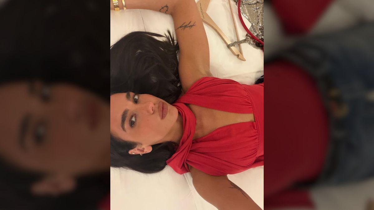 Photo of Dua Lipa embraced color in a trendy nighttime look.