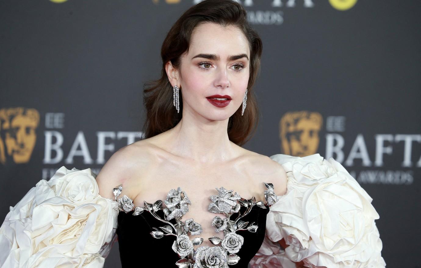 lily collins reveals favorite phil collins song too many