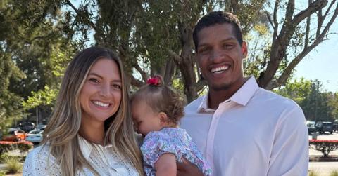 Photo of Allison Kuch, Isaac Rochell and their daughter, Scottie.